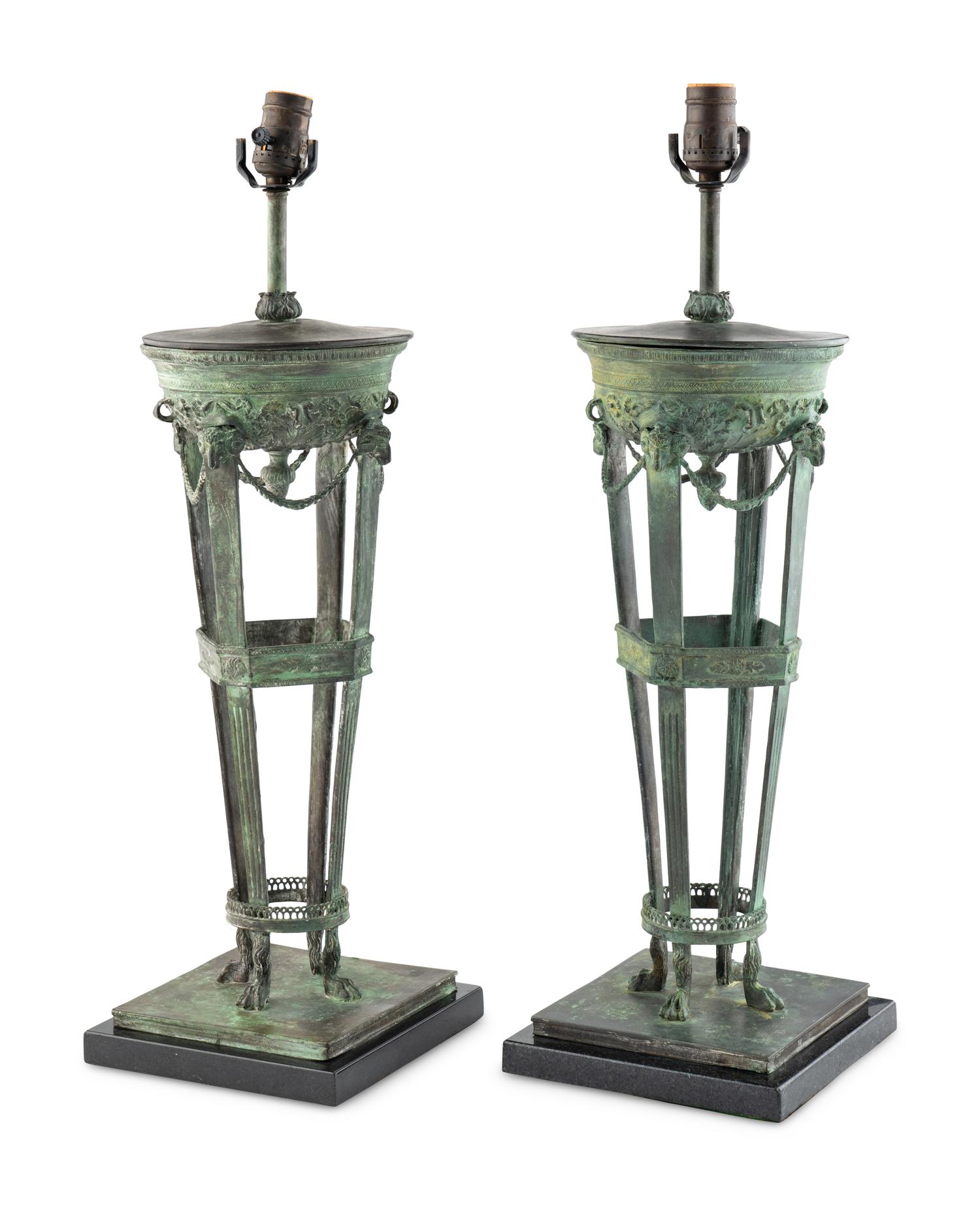A Pair of Patinated Cast Metal Athéniennes Mounted as Lamps