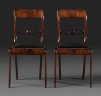 A Pair of Classical Figured and Carved Mahogany Klismos Side Chairs