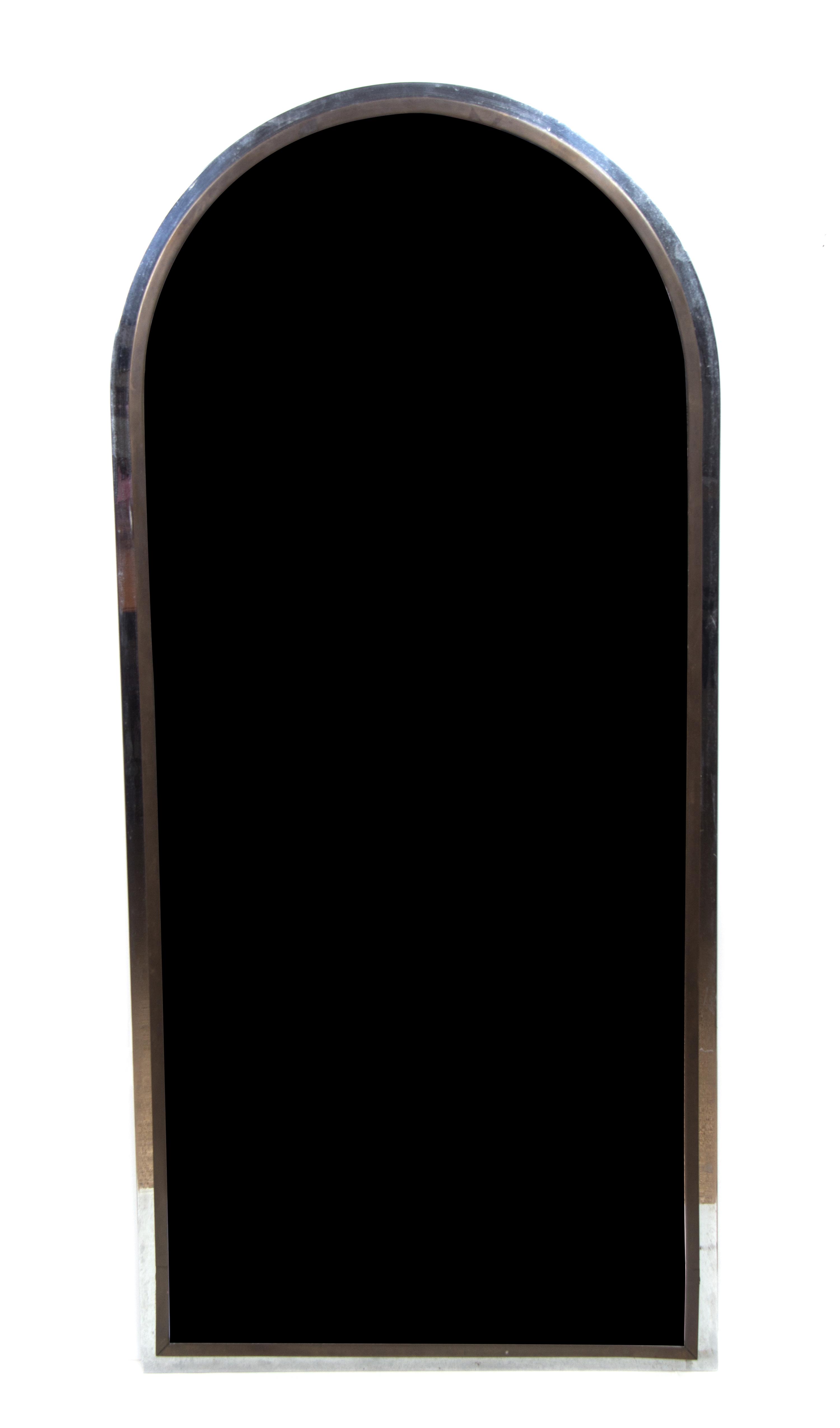 A Brass and Chrome Mirror, Height 48 inches x 22 inches.