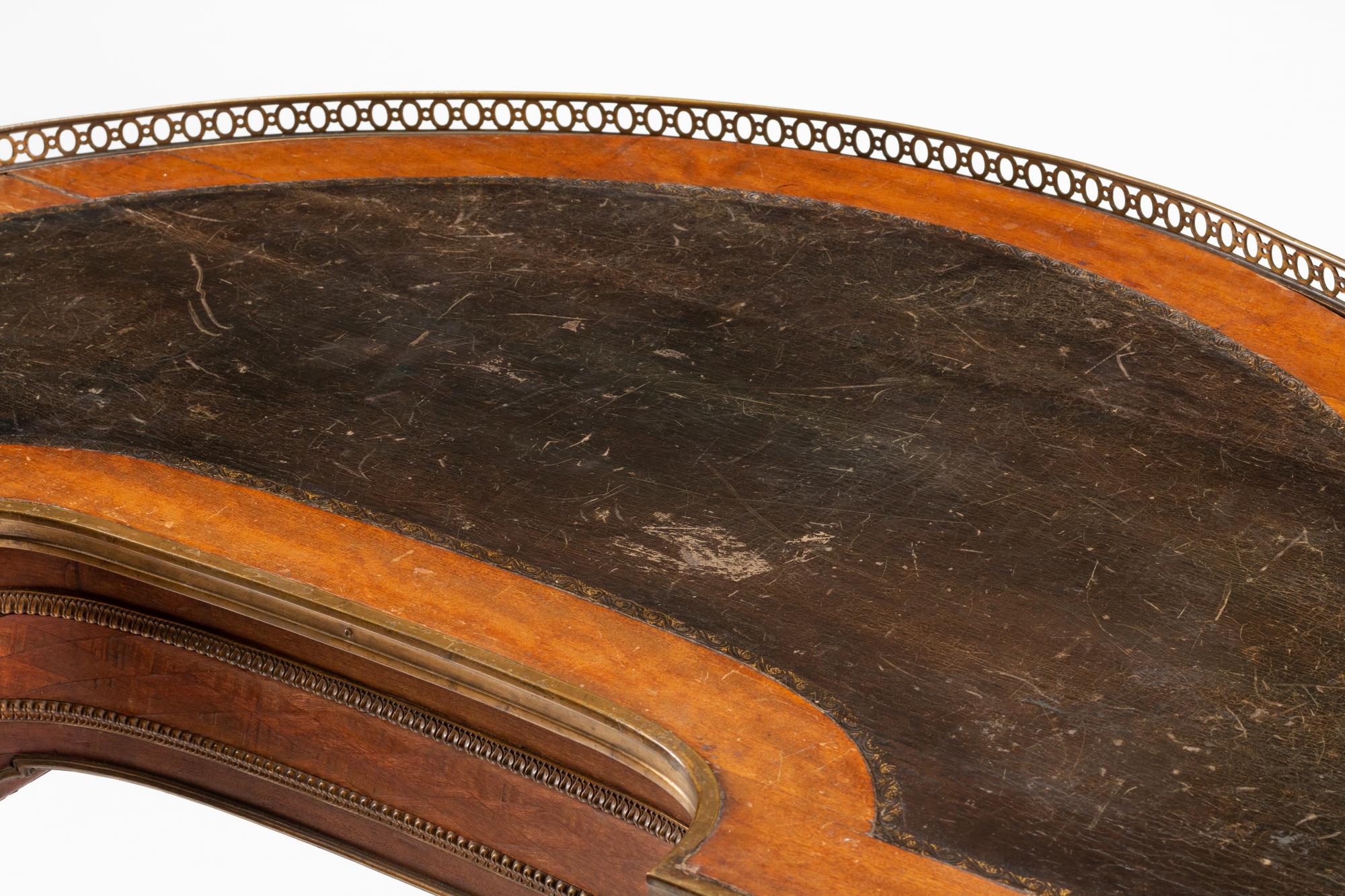 A Louis XVI Gilt Bronze Mounted Parquetry Demilune Writing Table