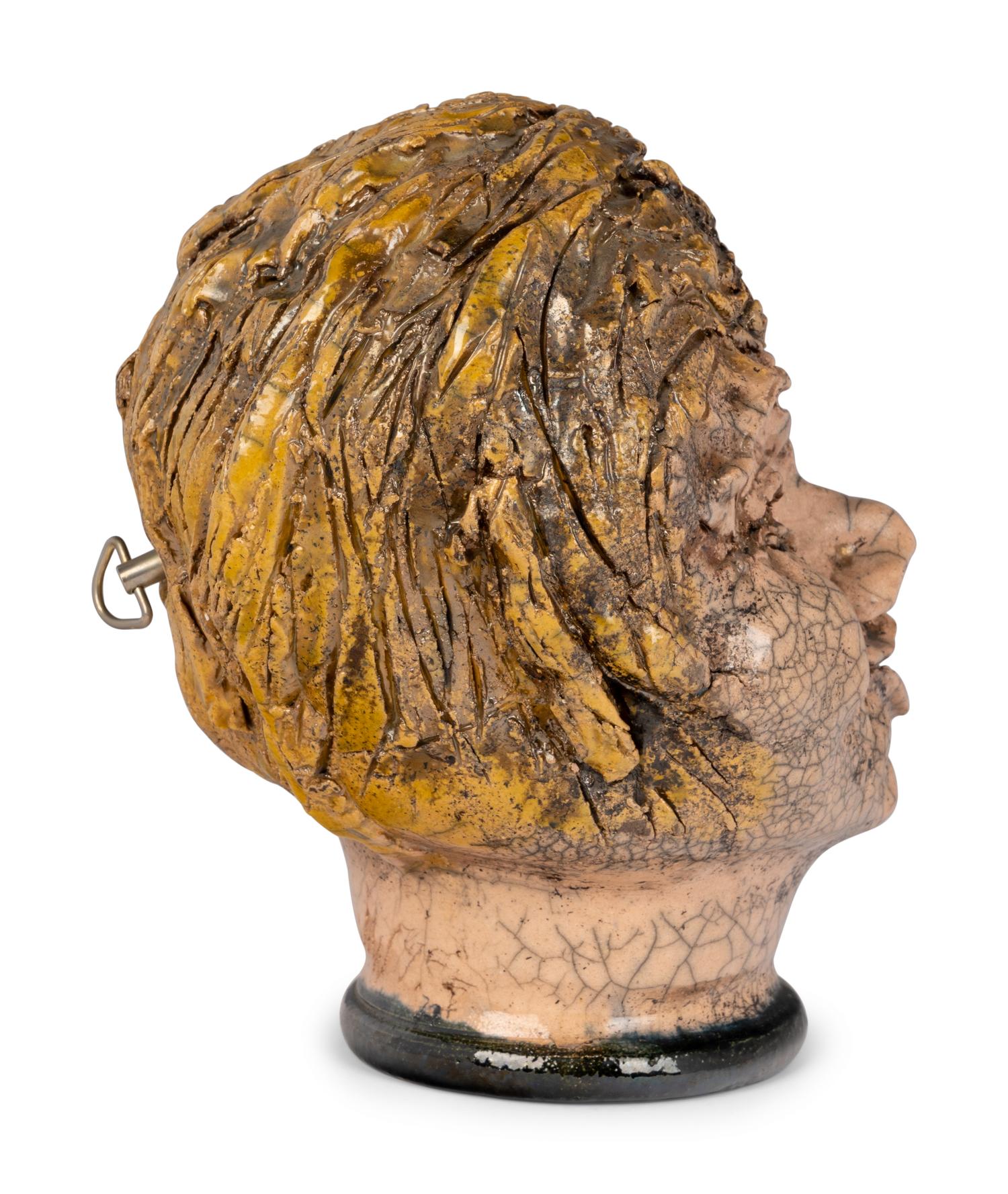 A Studio Ceramic Polychrome Glazed Musical Head