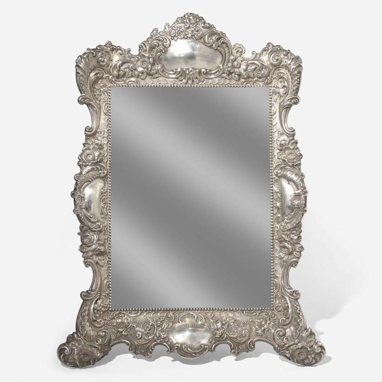 A sterling silver floral repoussé dressing mirror Reed & Barton, Taunton, MA, early 20th century