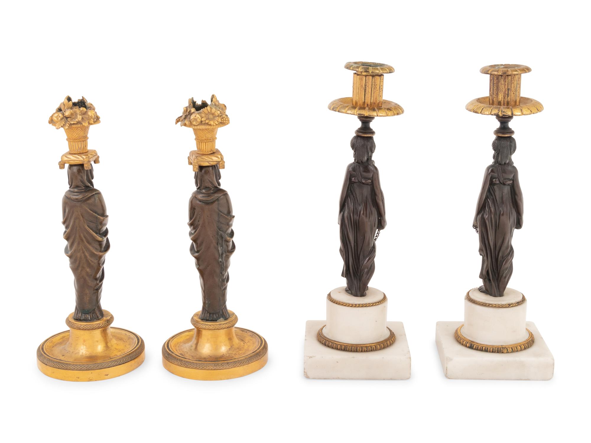 Two Pairs of French Gilt and Patinated Bronze Figural Candlesticks