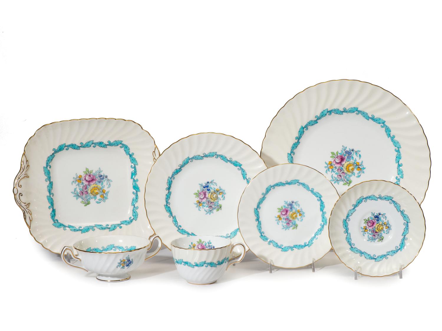 A Minton Porcelain Dinner Service