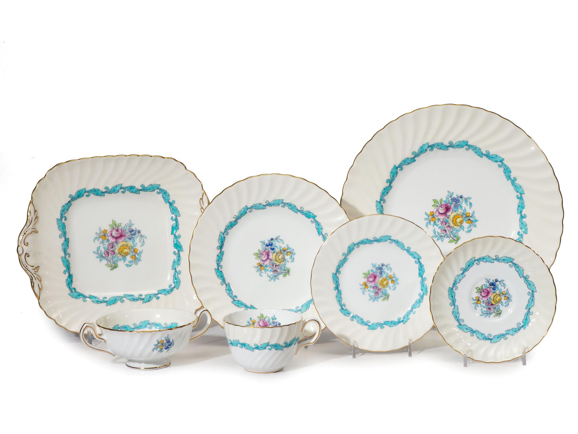 A Minton Porcelain Dinner Service