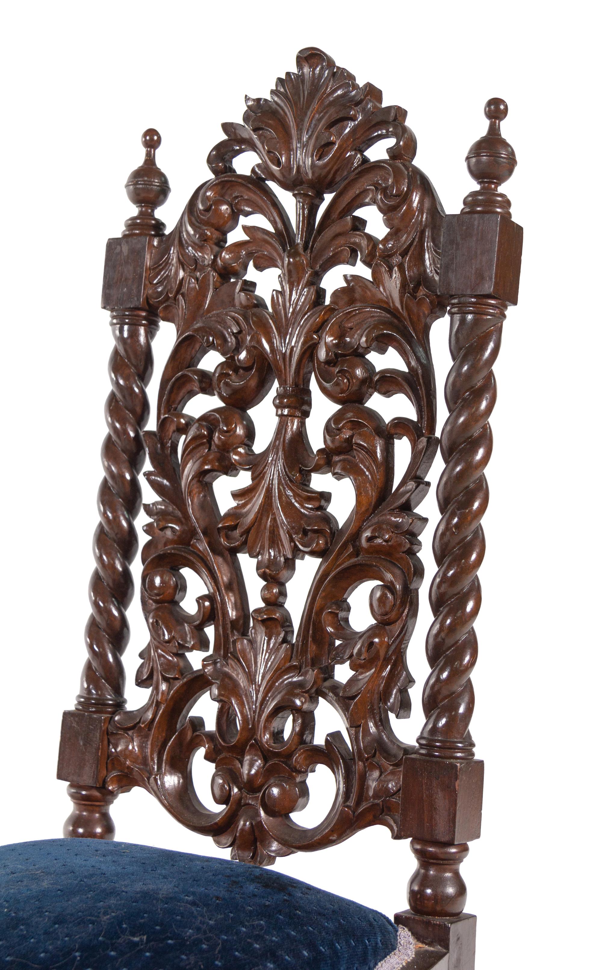 A Set of Ten Jacobean Style Carved Walnut Dining Chairs