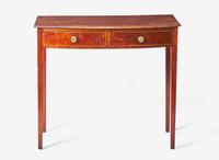 A George III bow-front inlaid mahogany serving table, circa 1790