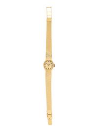 NIVADA, 18K YELLOW GOLD WATCH