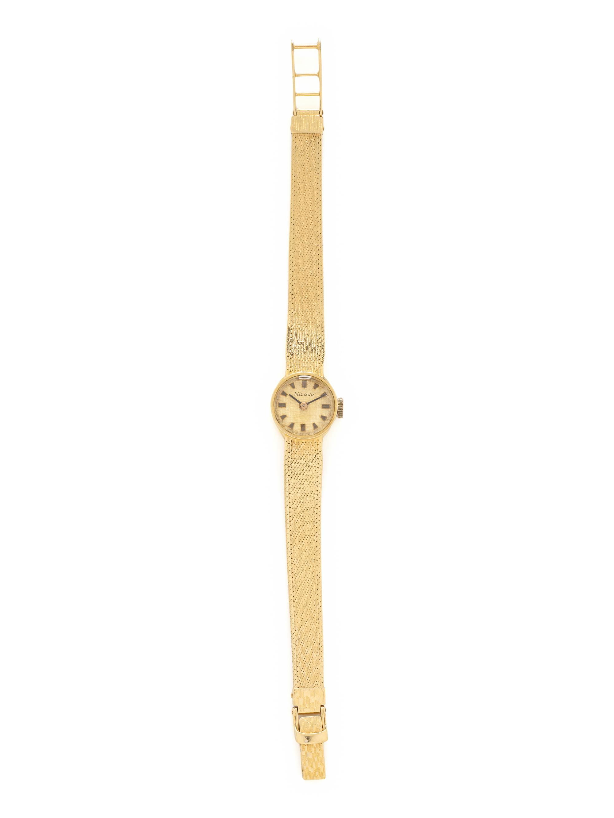 NIVADA, 18K YELLOW GOLD WATCH