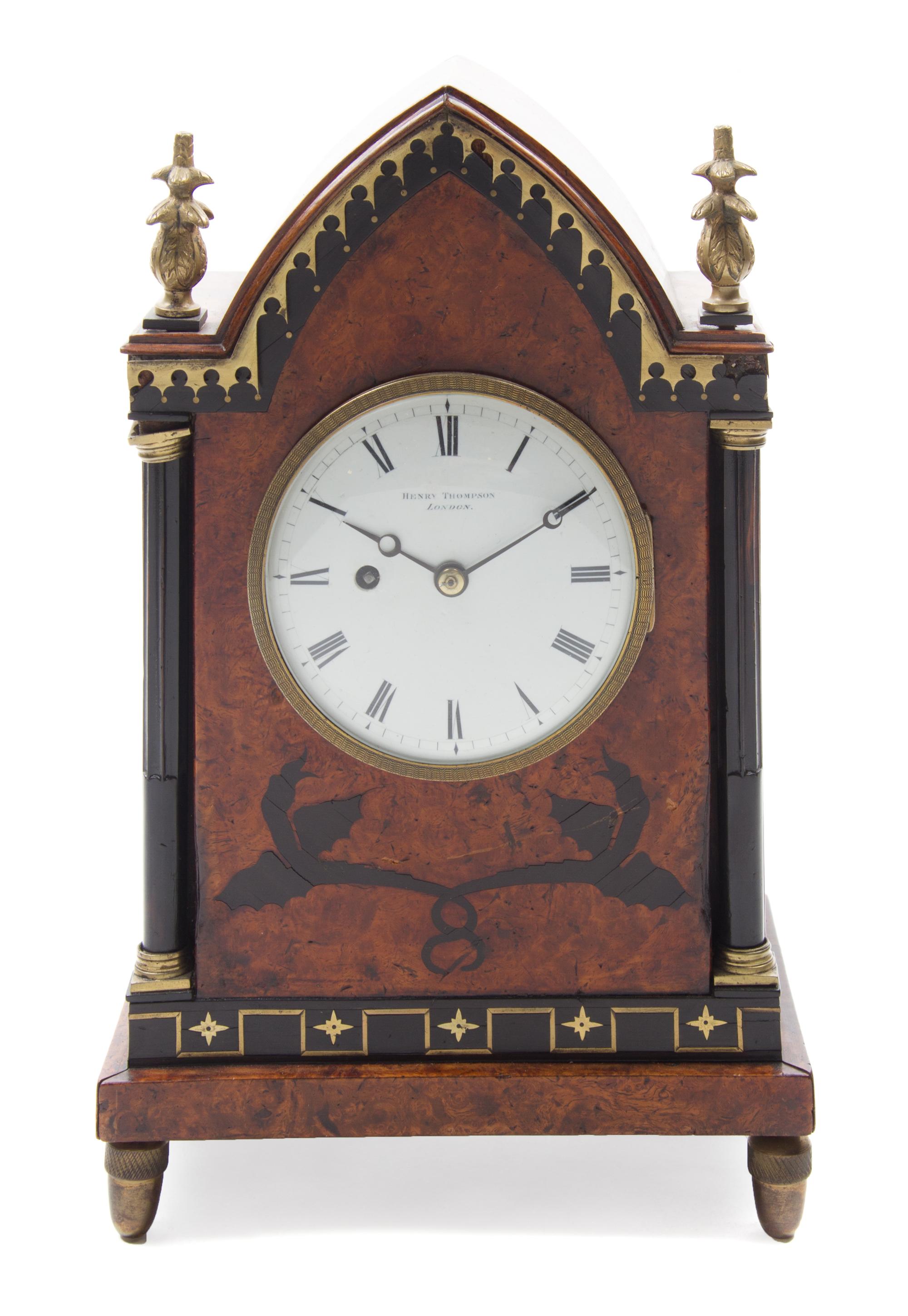 An English Brass and Ebony Inlaid Burlwood Mantel Clock Height 13 1/2 inches. — HENRY THOMPSON, LONDON