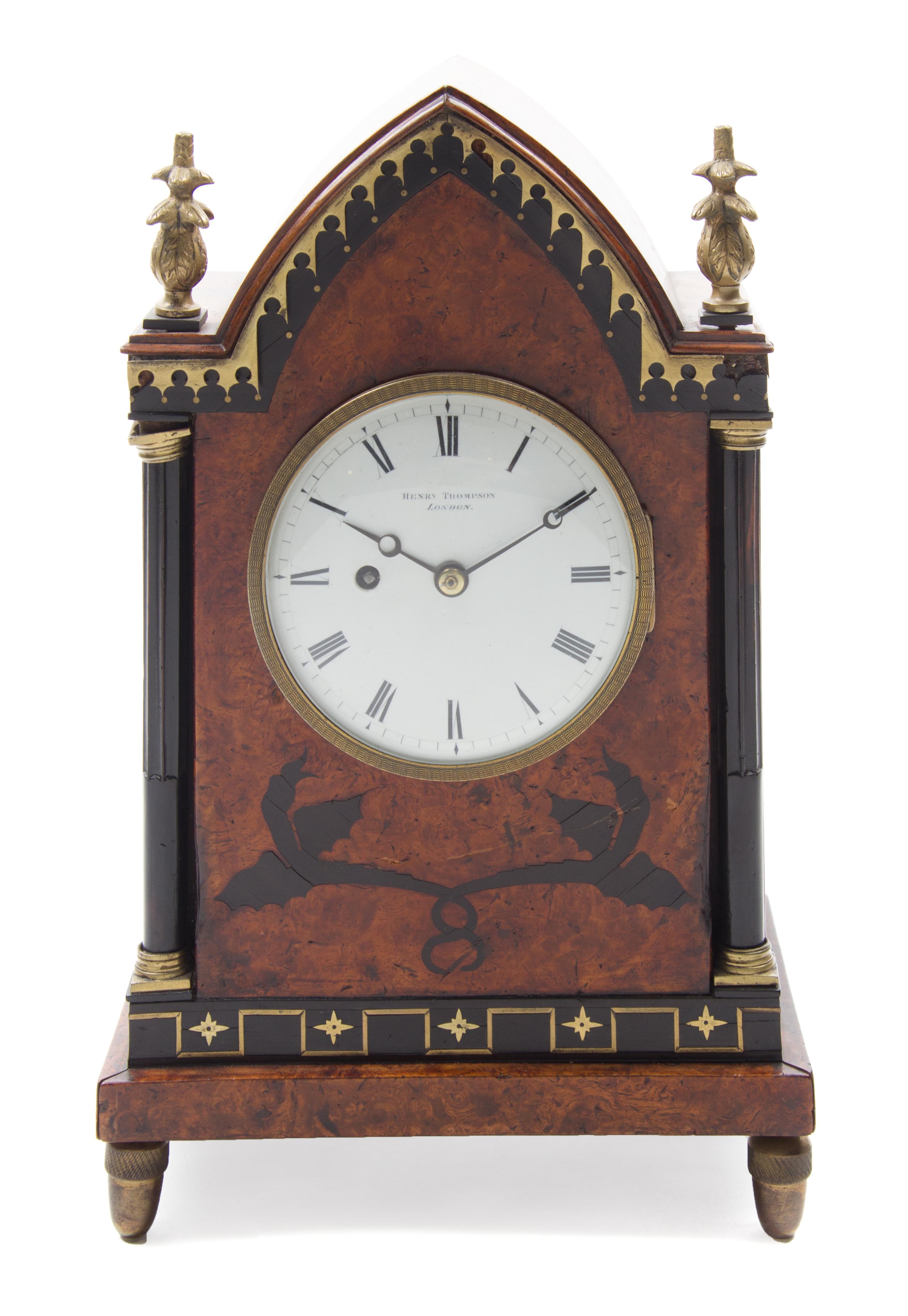 An English Brass and Ebony Inlaid Burlwood Mantel Clock Height 13 1/2 inches. — HENRY THOMPSON, LONDON