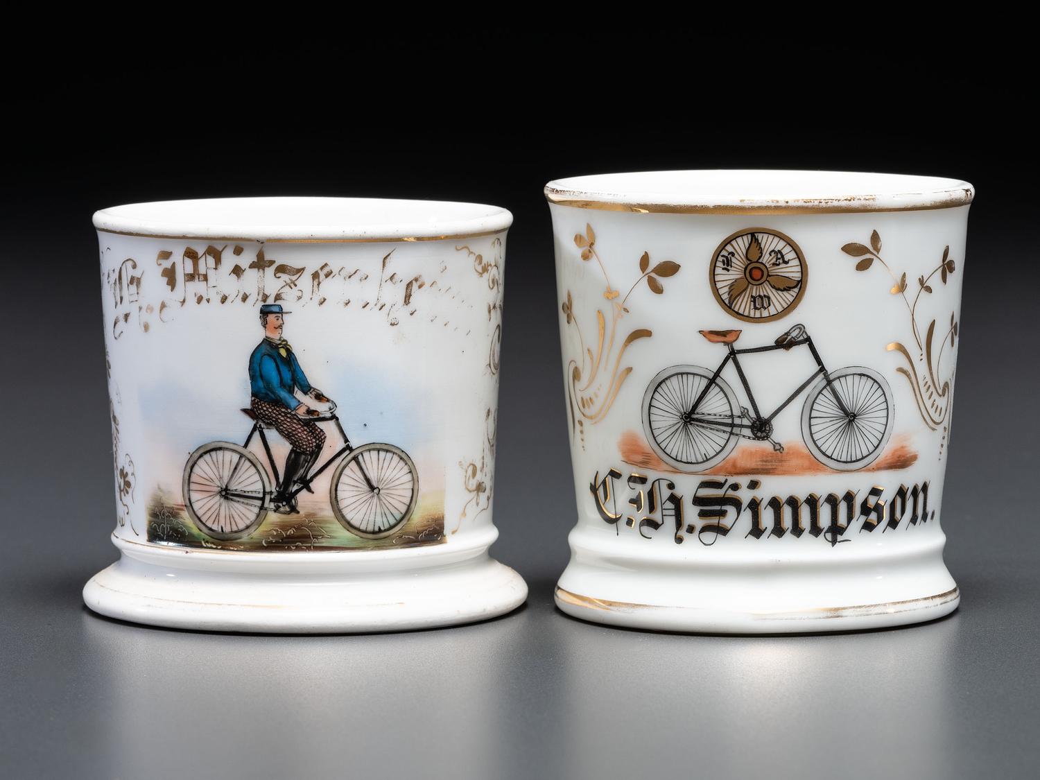 Two Cyclist's Porcelain Shaving Mugs