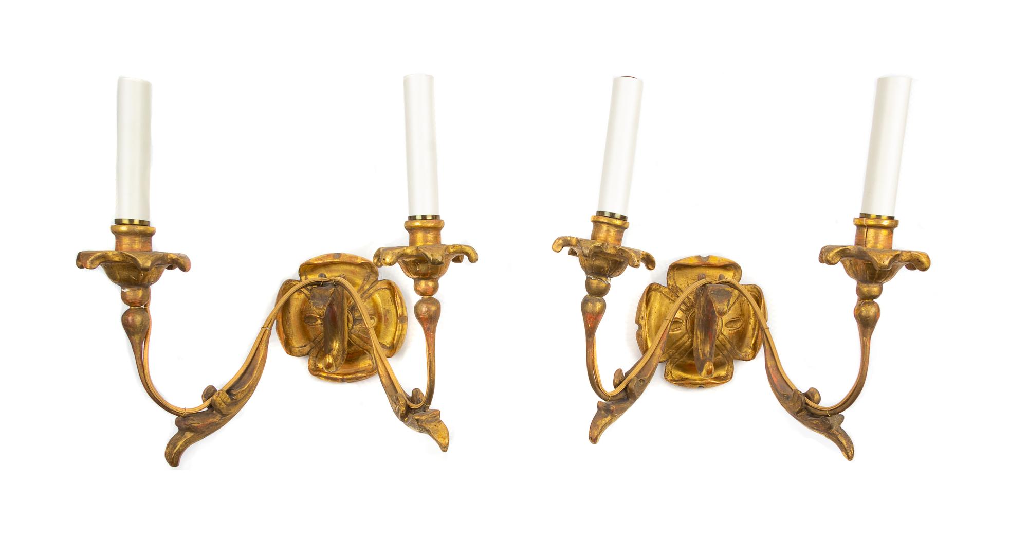 A Pair of Continental Giltwood Two-Light Sconces Width 13 inches. — 19TH CENTURY