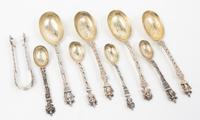 A Group of Southeast Asian Silver Articles, , comprising four spoons, four serving spoons, one pair of tongs, and two bowls.