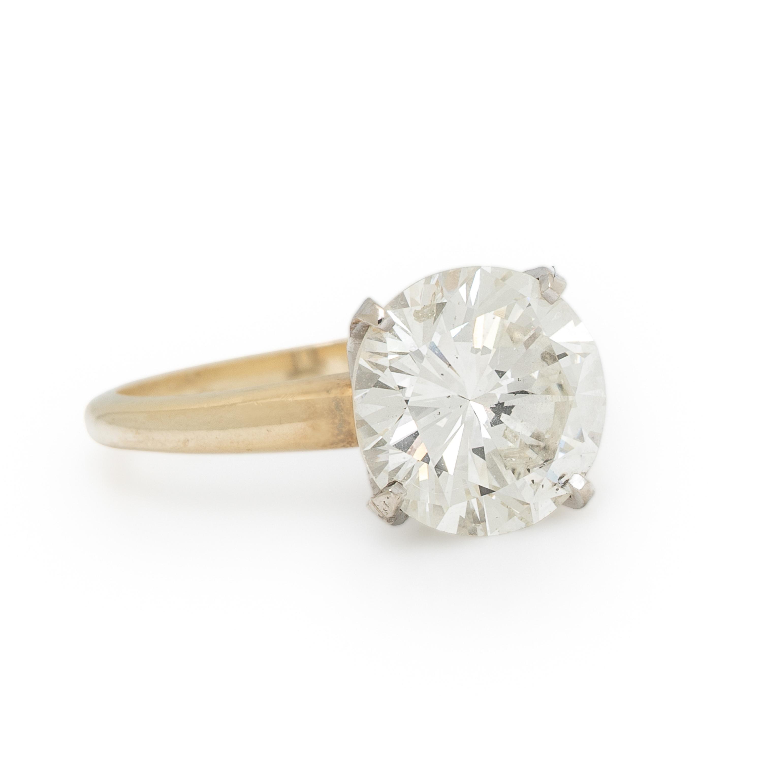 DIAMOND AND BICOLOR GOLD RING WITH JACKET