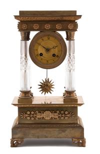 A Charles X Gilt Bronze and Crystal Portico Clock
