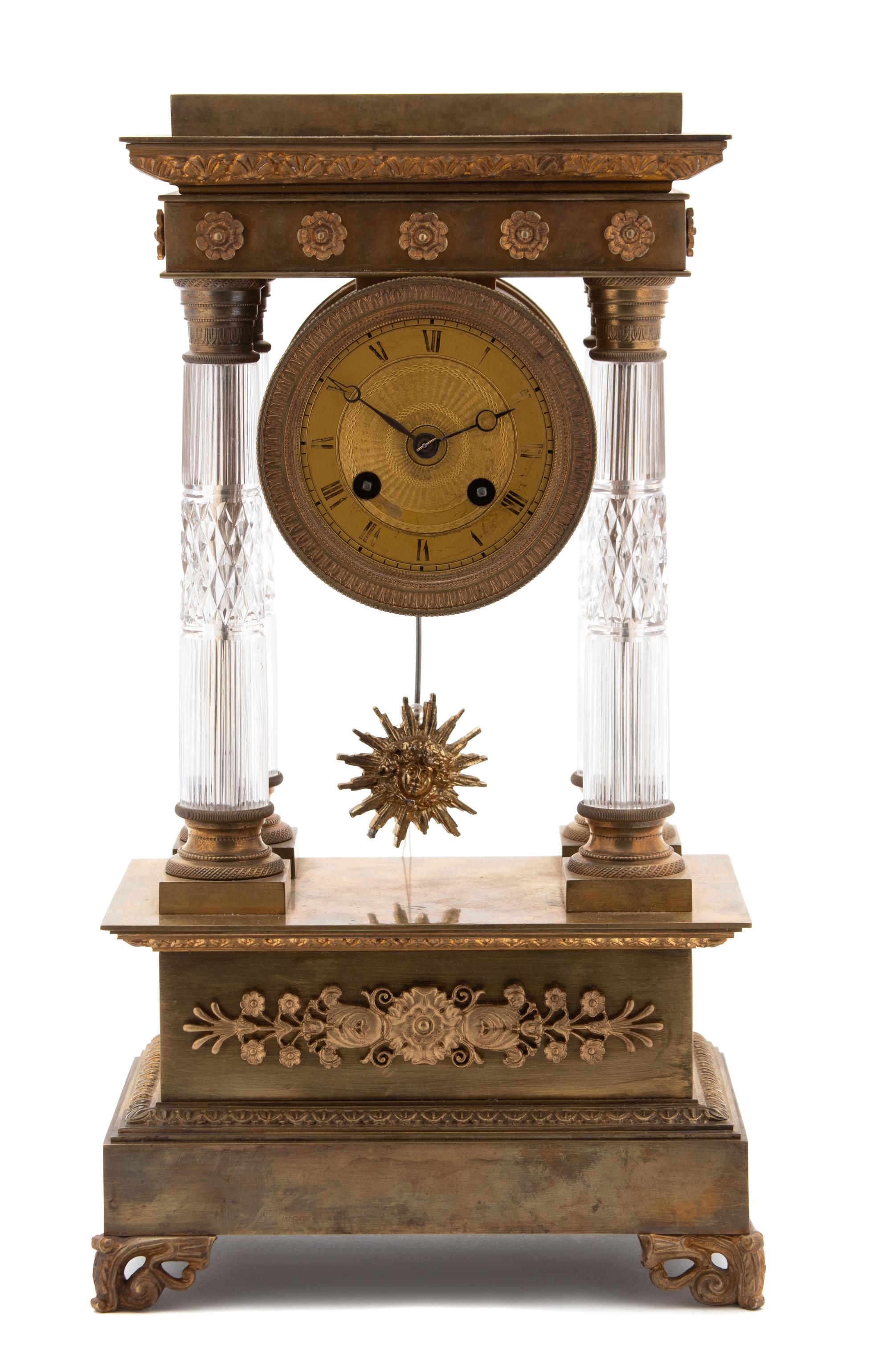 A Charles X Gilt Bronze and Crystal Portico Clock