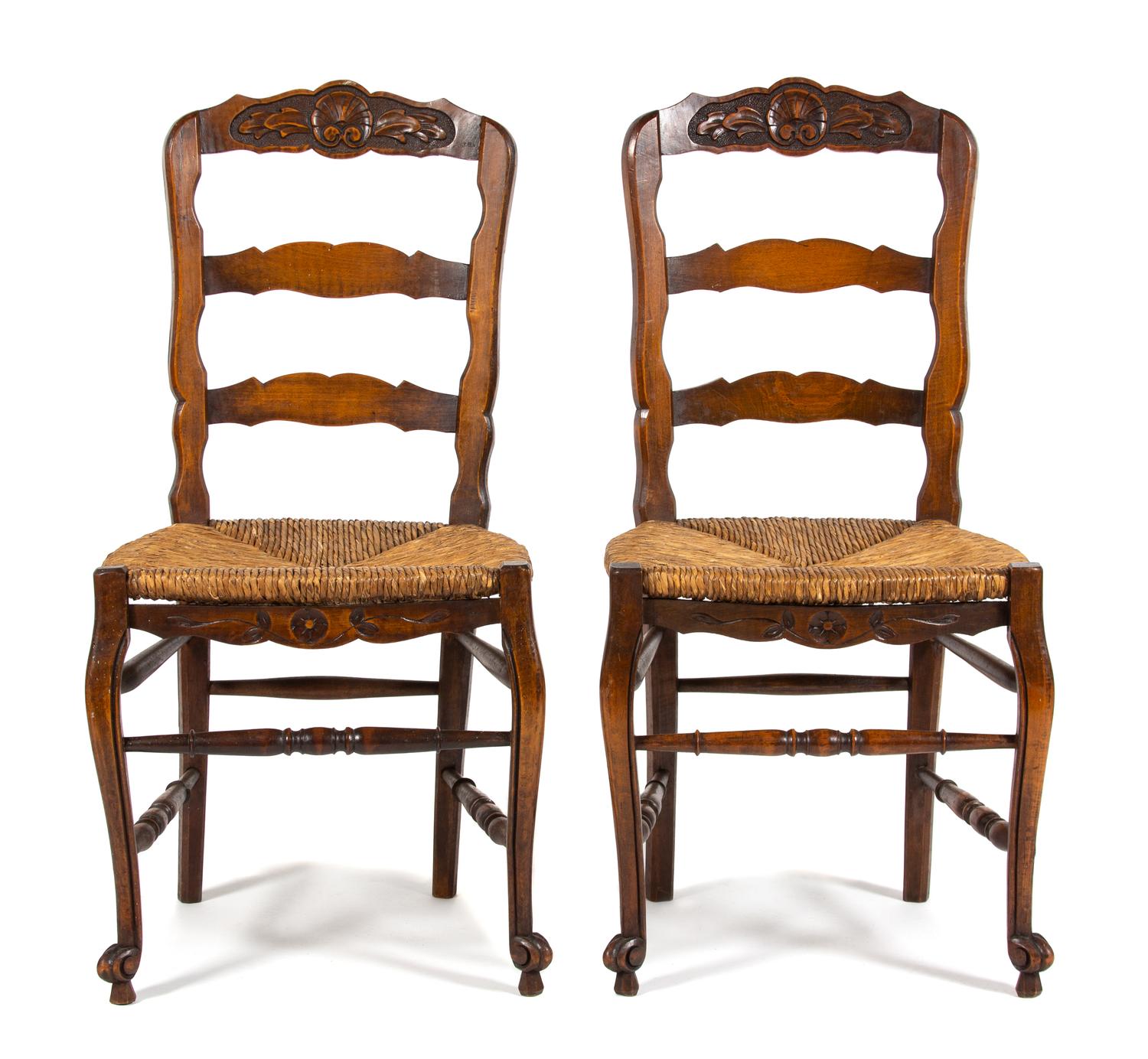 Pair of French Provincial Style Carved Fruitwood Side Chairs Height 38 inches. — 19TH CENTURY