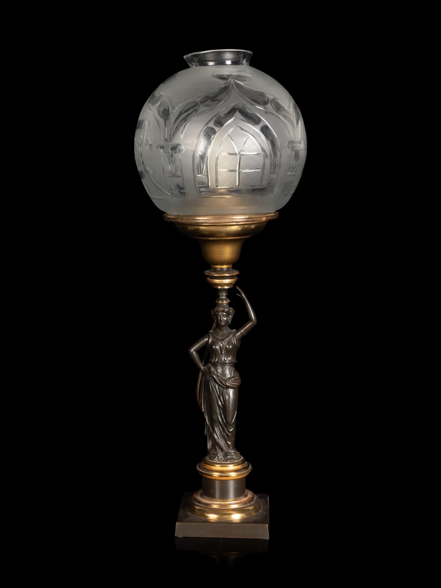 A Classical Patinated Bronze Figural Sinumbra Lamp