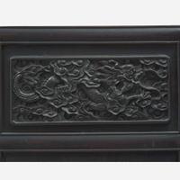 A Chinese carved hardwood six-panel “Dragons” screen 硬木浮雕龙纹六开屏风