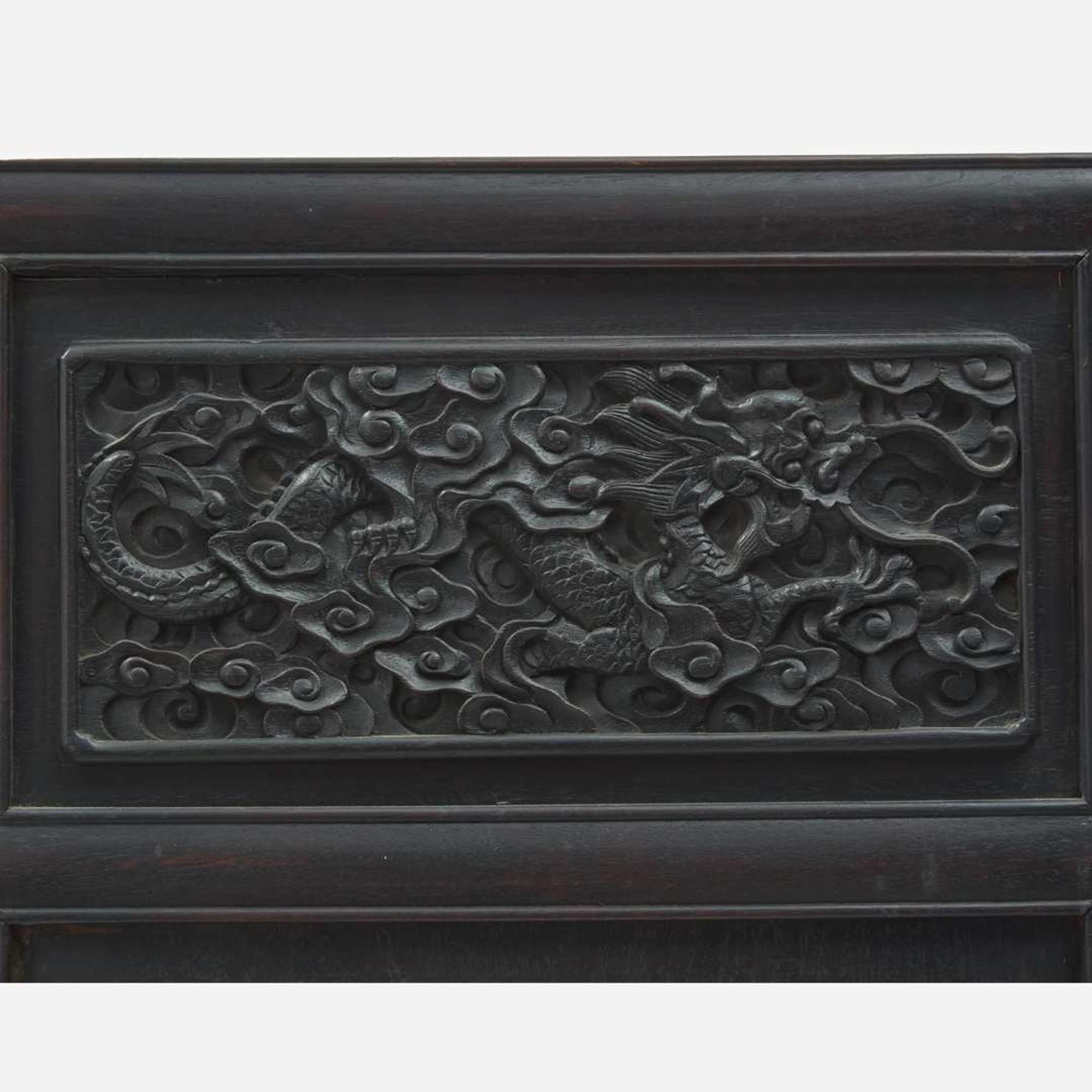 A Chinese carved hardwood six-panel “Dragons” screen 硬木浮雕龙纹六开屏风