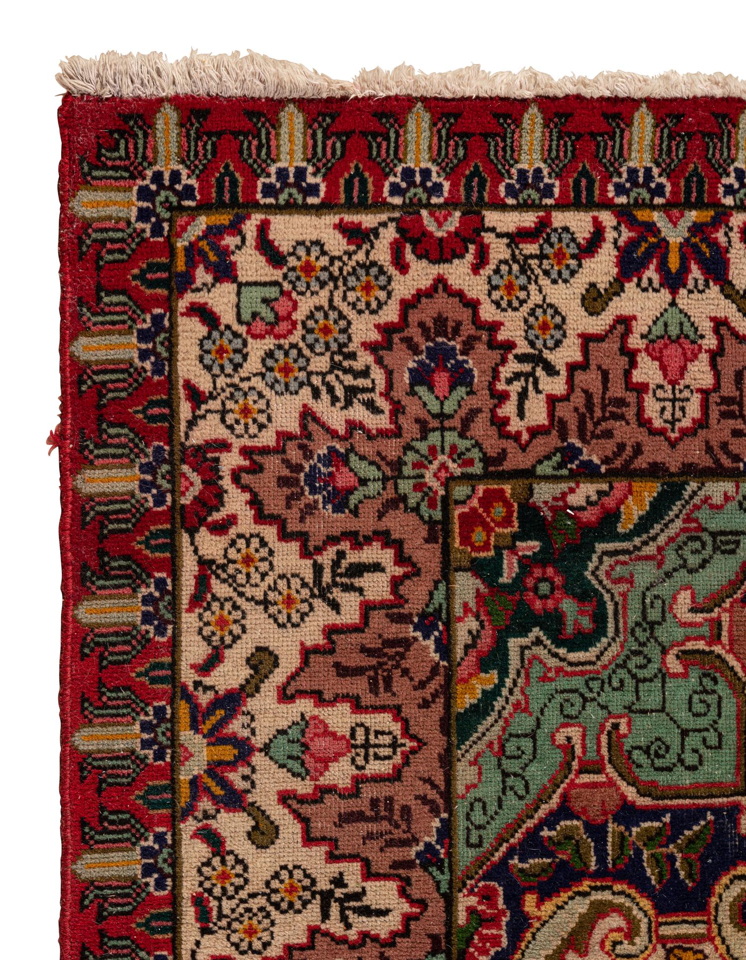 A Tabriz Wool Rug