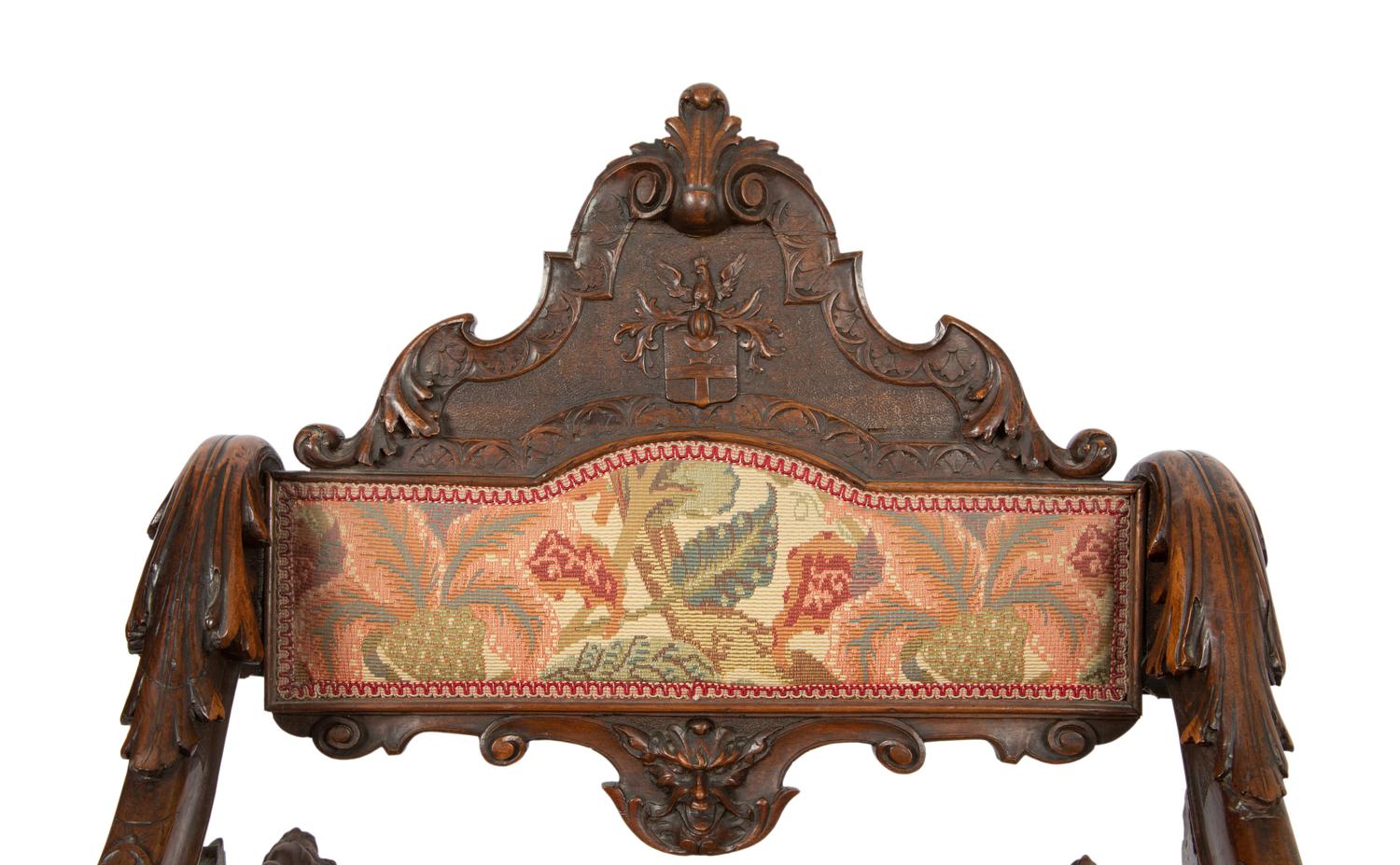 An Italian Carved Walnut Fantasy Rocking Chair