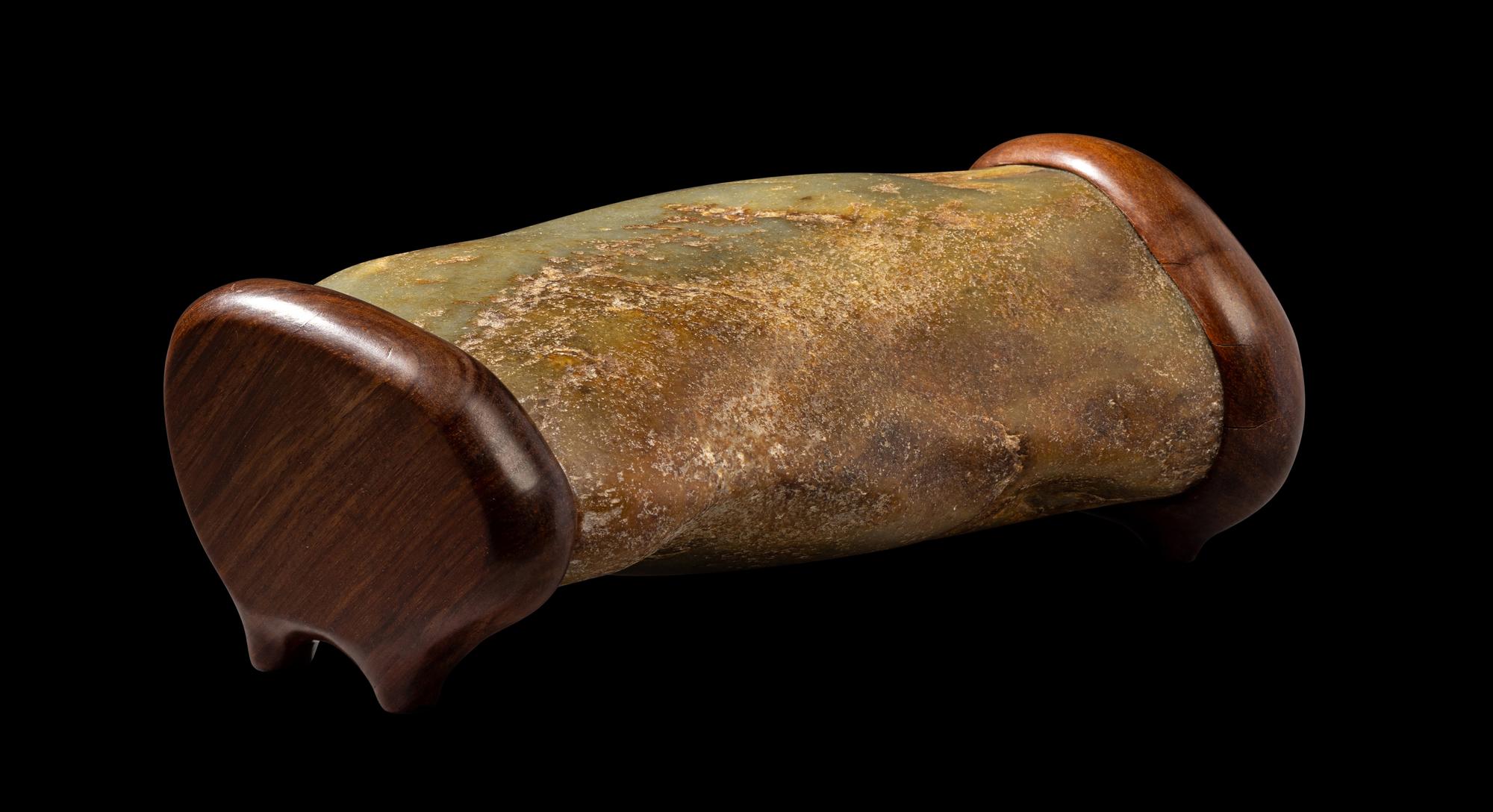 A Chinese Celadon Jade Pillow
