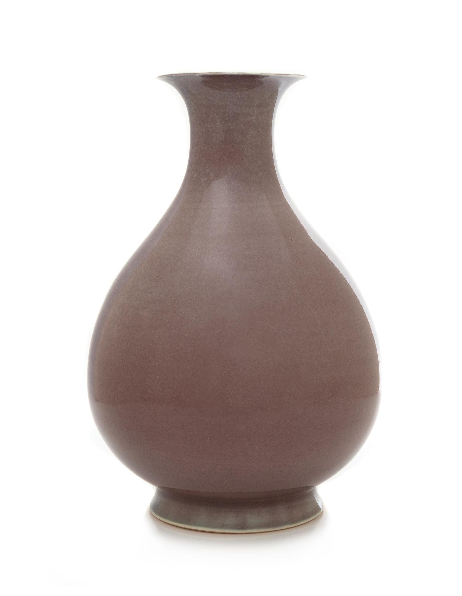 A Copper Red Glazed Porcelain Vase, Yuhuchun Ping Height 11 1/4 inches. — QIANLONG PERIOD (1735-1796)