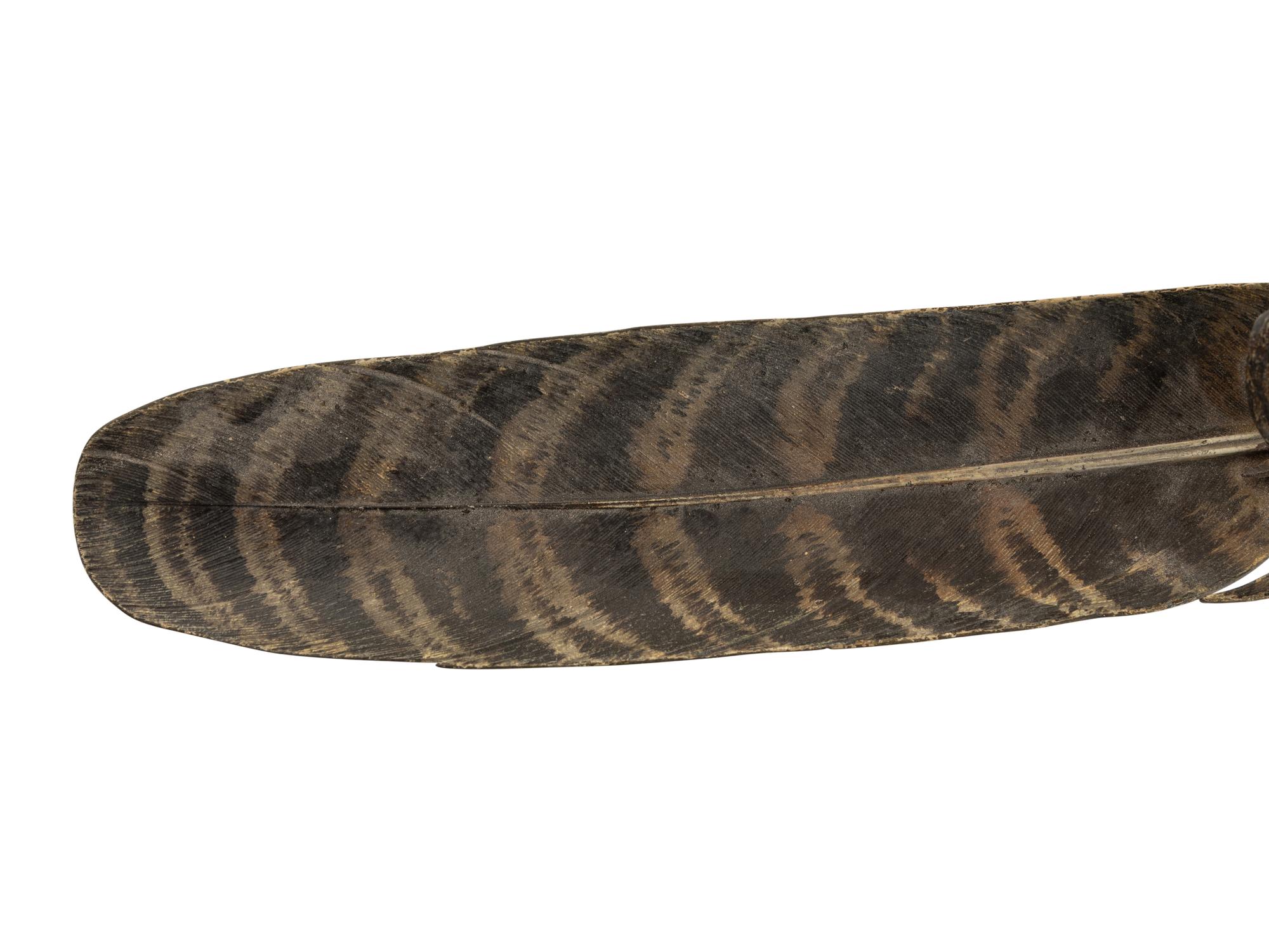 An Austrian Cold-Painted Bronze Figure of a Bird of Prey Perched on a Feather