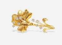 A Yellow Gold and Diamond Flower Brooch