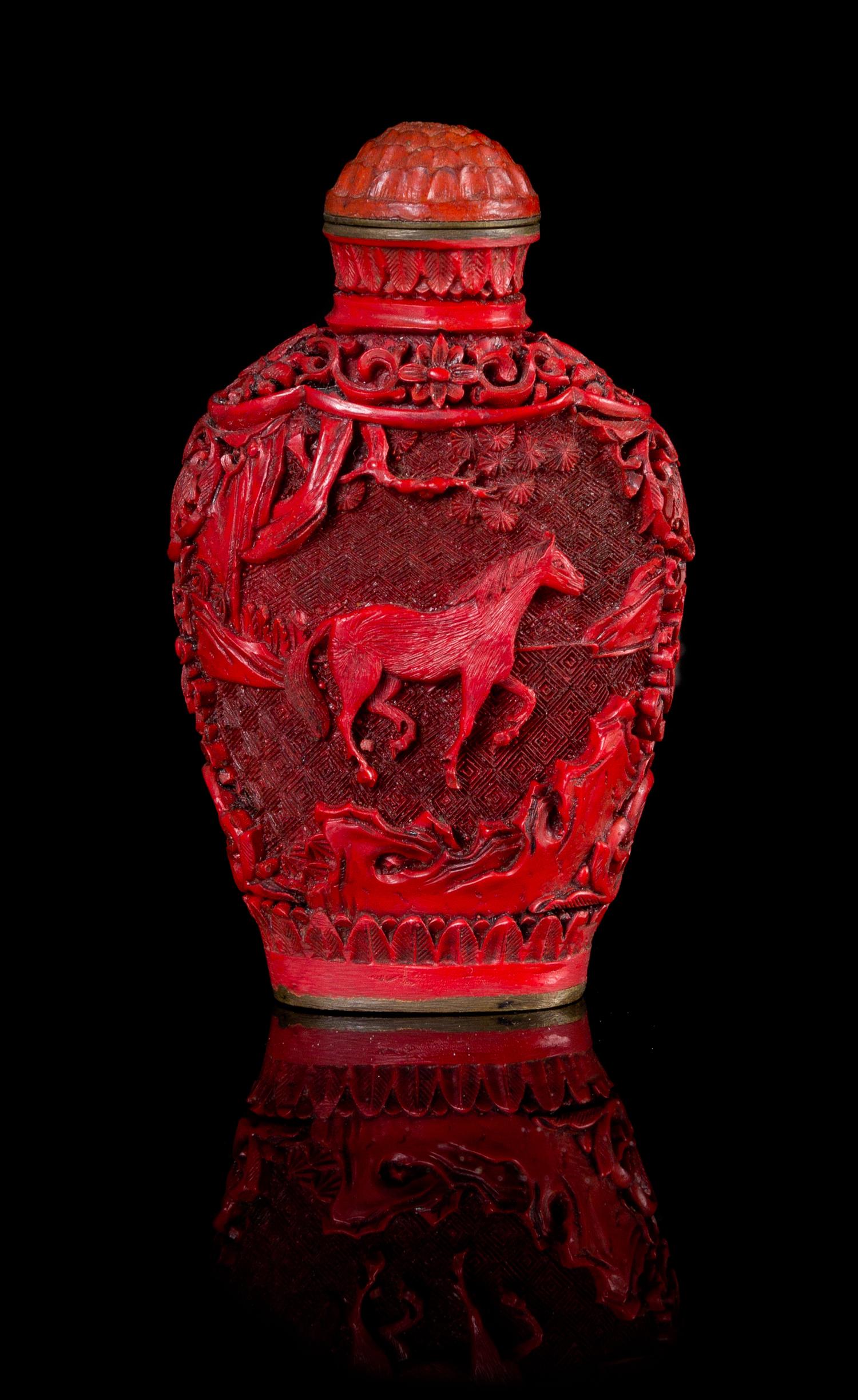 A Cinnabar Lacquer Snuff Bottle Height 3 1/8 inches.
