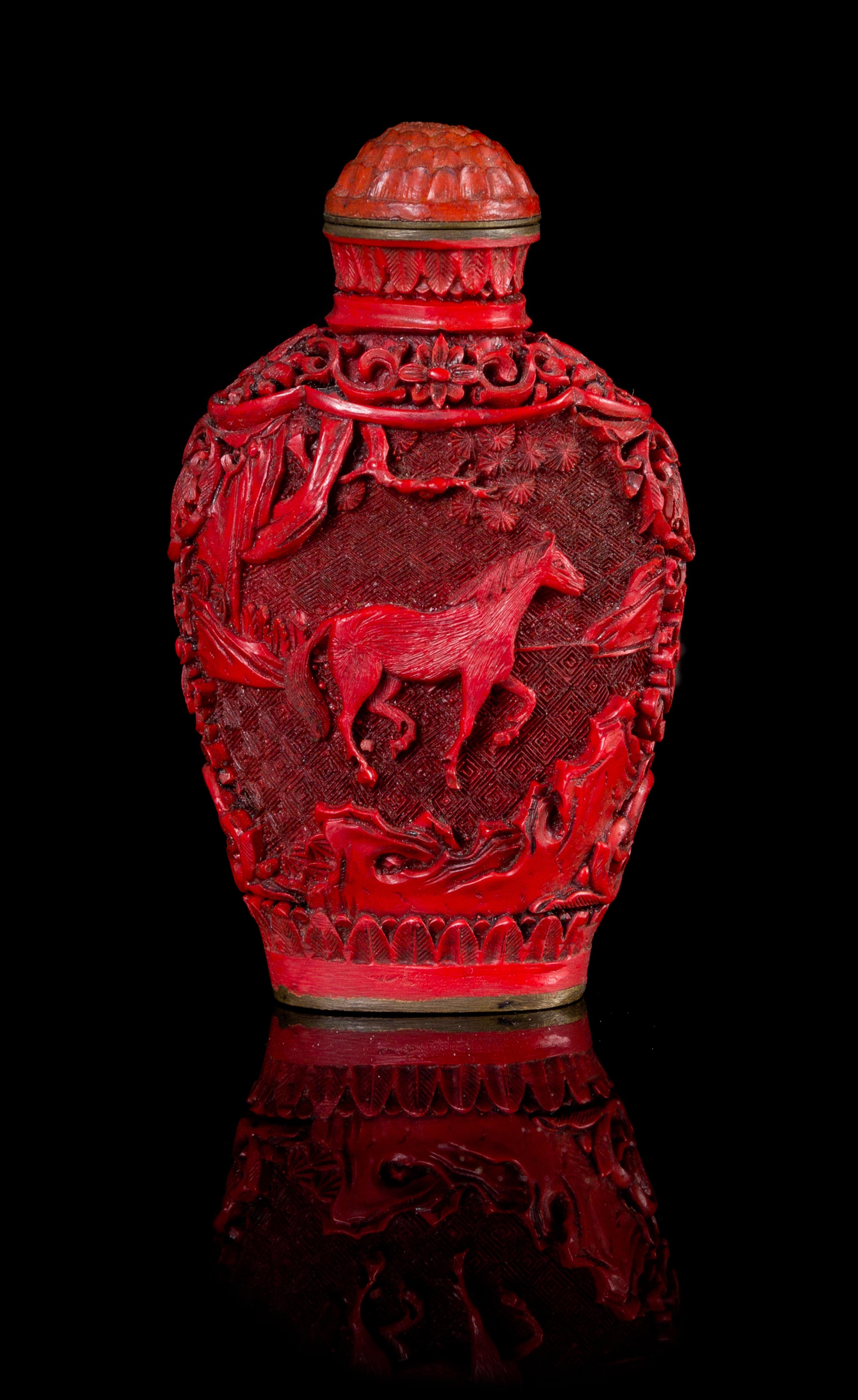 A Cinnabar Lacquer Snuff Bottle Height 3 1/8 inches.