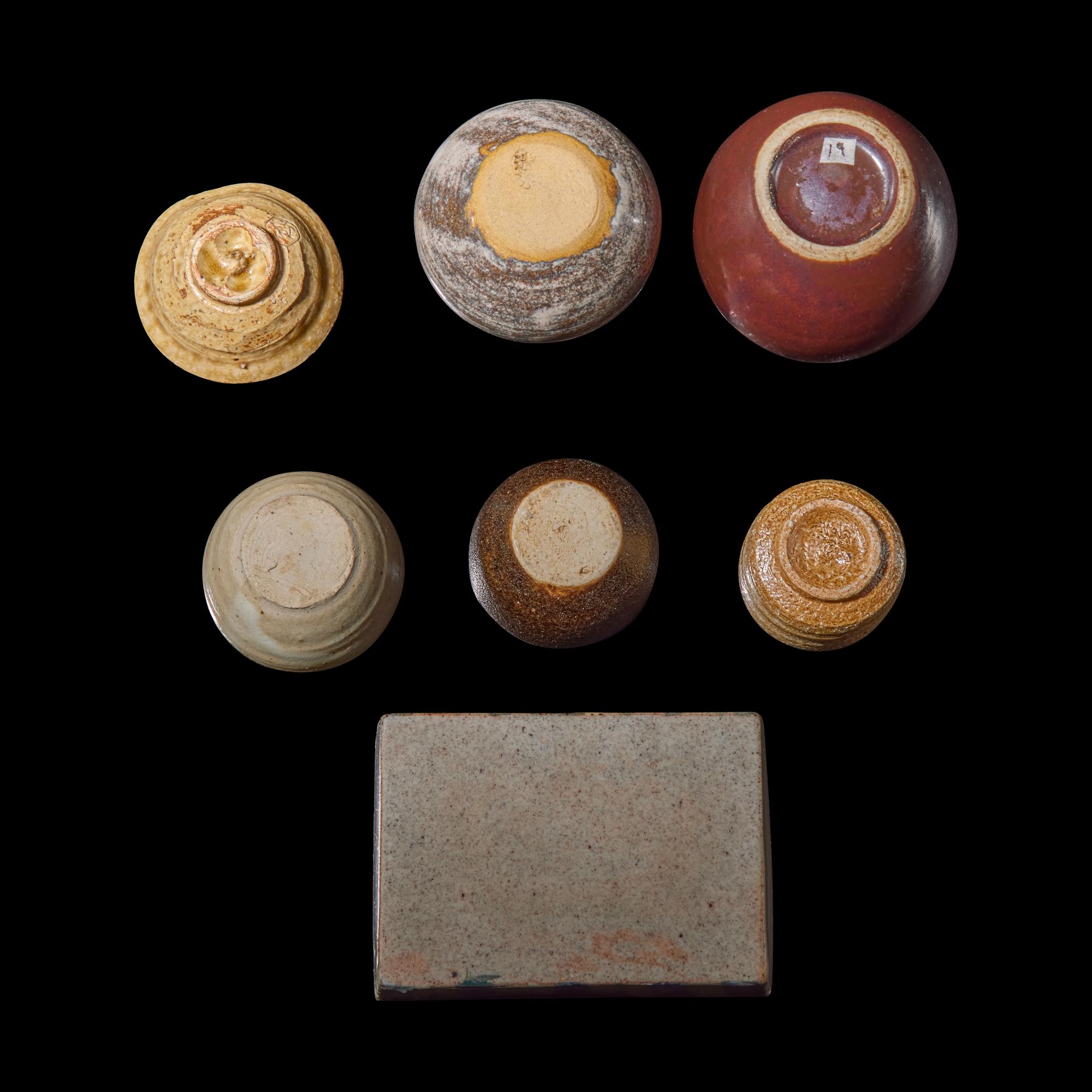 A Group of Seven Assorted Japanese Sake Cups, Small Vases, and a Rectangular Vessel, 20th Century