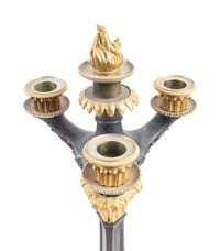 A Pair of Charles X Style Gilt and Patinated Bronze Four-Light Candelabra