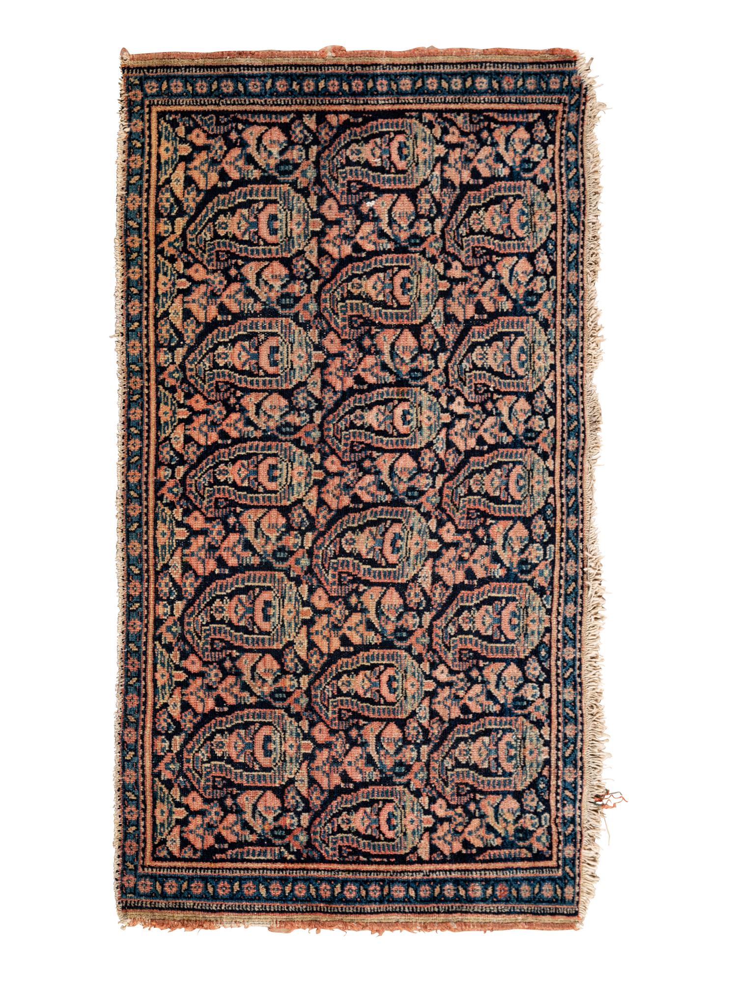 A Persian Senneh Wool Rug