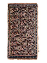 A Persian Senneh Wool Rug