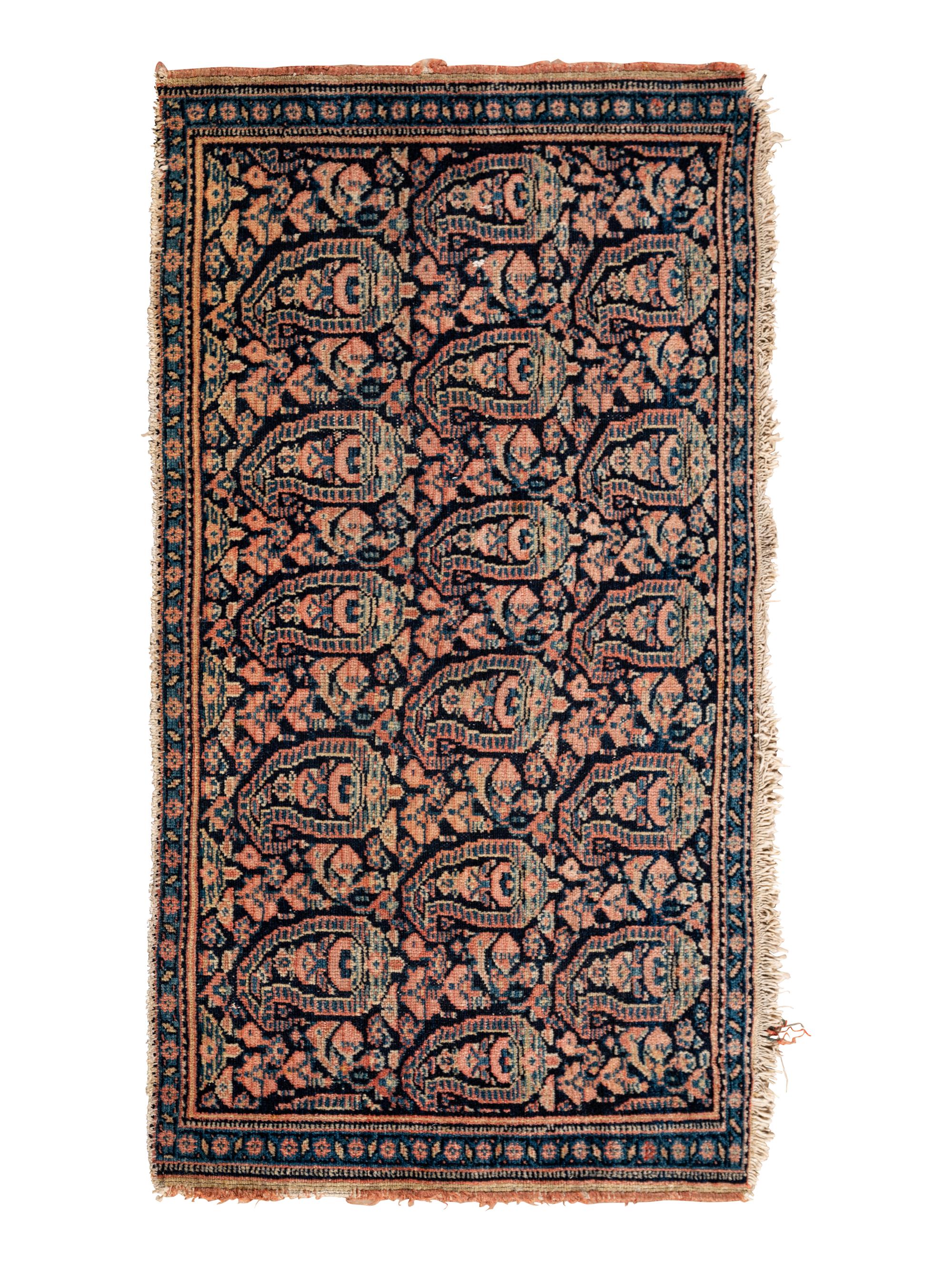 A Persian Senneh Wool Rug