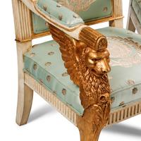 An Italian Neoclassical Style Painted and Parcel Gilt Three-Piece Seating Suite