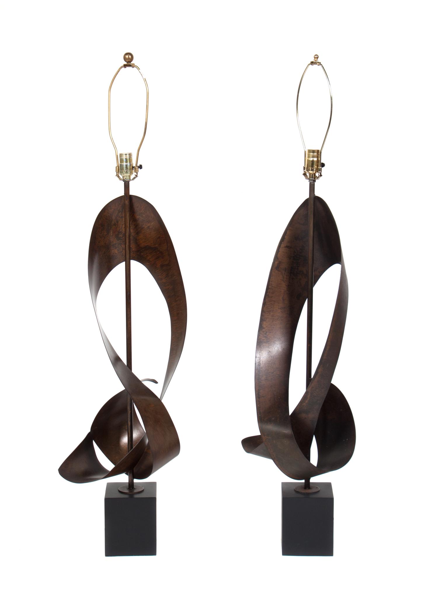 A Pair of Brutalist Ribbon Form Table Lamps Height of each 58 inches. — HARRY BALMER FOR LAUREL