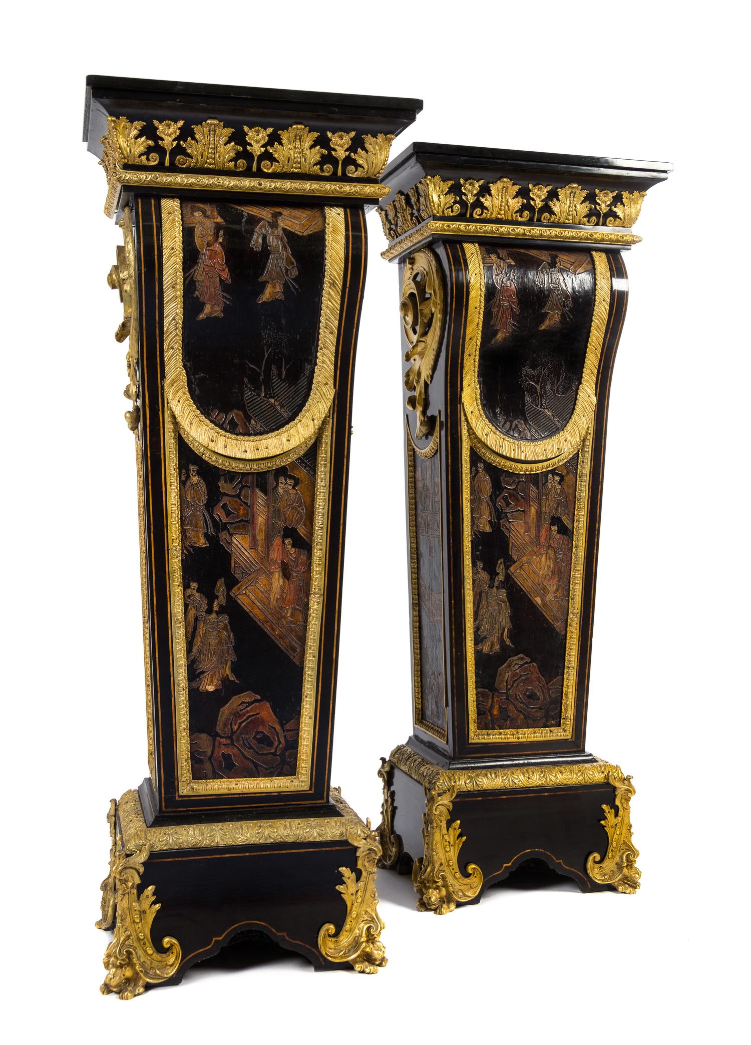 A Pair of Napoleon III Gilt Bronze Mounted and Coromandel Lacquer Inset Ebony Pedestals Height 55 1/2 x width 20 3/4 x depth 13 7/8 inc — 19TH CENTURY