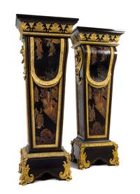 A Pair of Napoleon III Gilt Bronze Mounted and Coromandel Lacquer Inset Ebony Pedestals Height 55 1/2 x width 20 3/4 x depth 13 7/8 inc — 19TH CENTURY