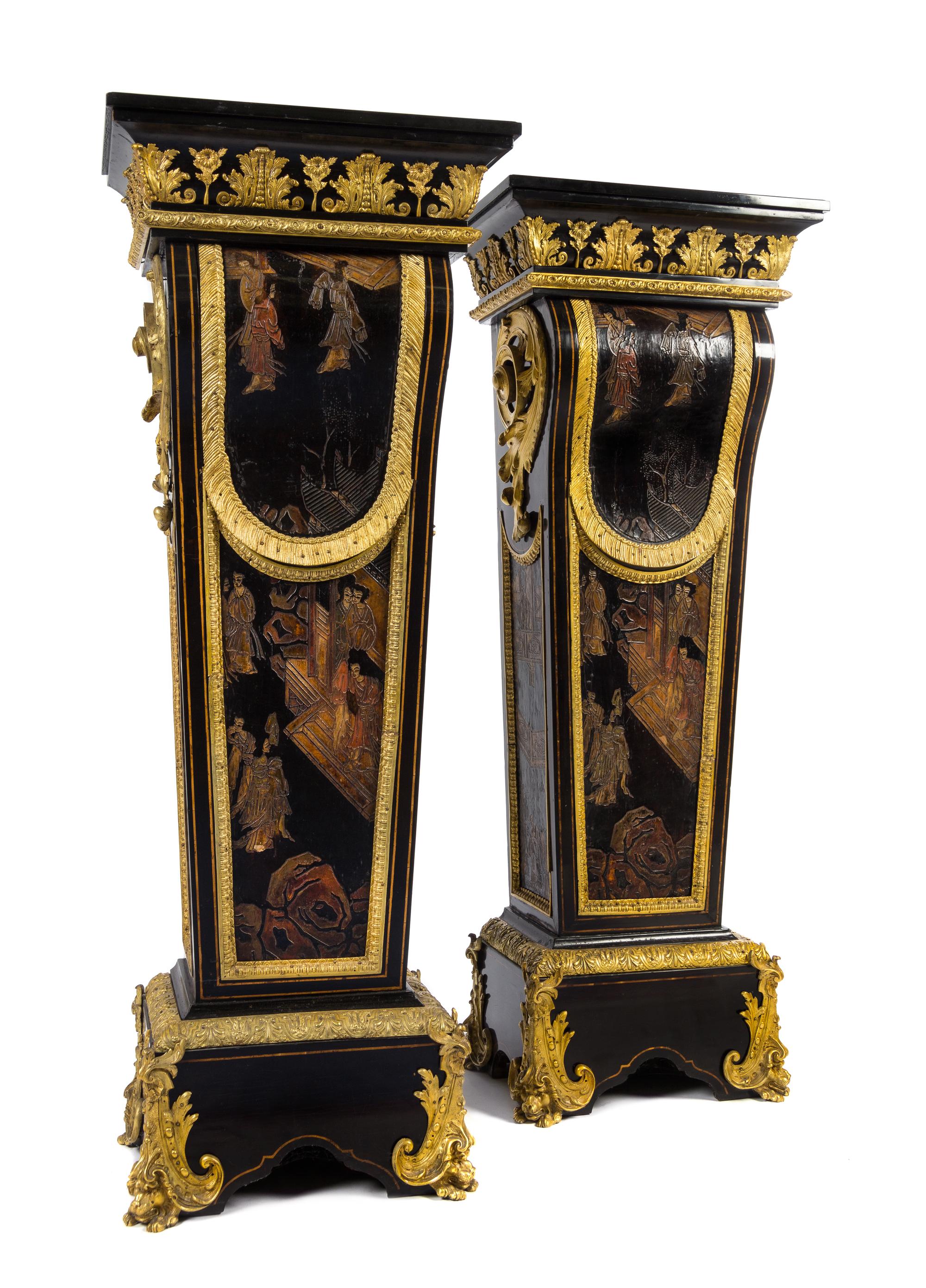 A Pair of Napoleon III Gilt Bronze Mounted and Coromandel Lacquer Inset Ebony Pedestals Height 55 1/2 x width 20 3/4 x depth 13 7/8 inc — 19TH CENTURY