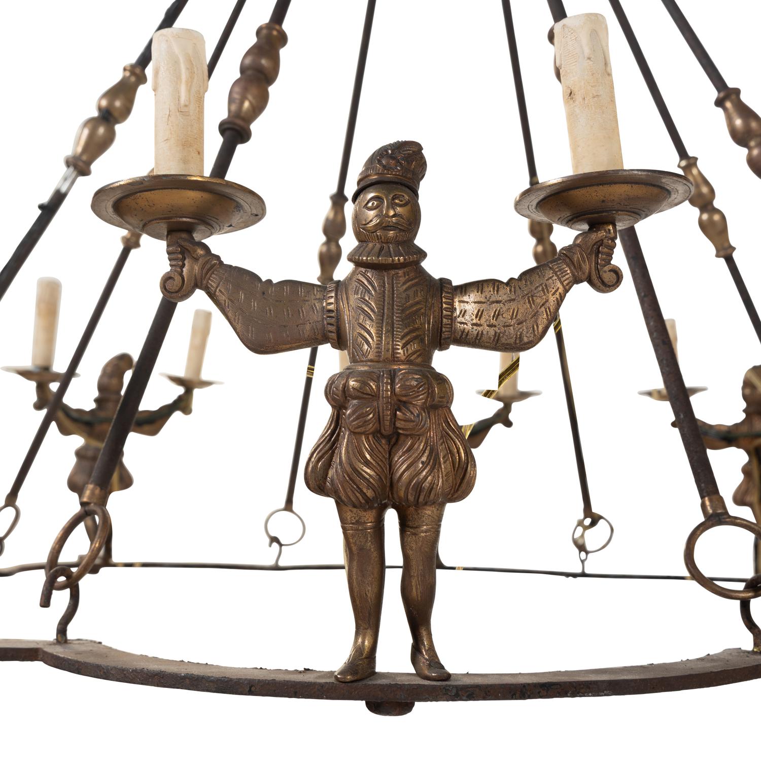 A Bronze and Iron Figural Sixteen-Light Chandelier