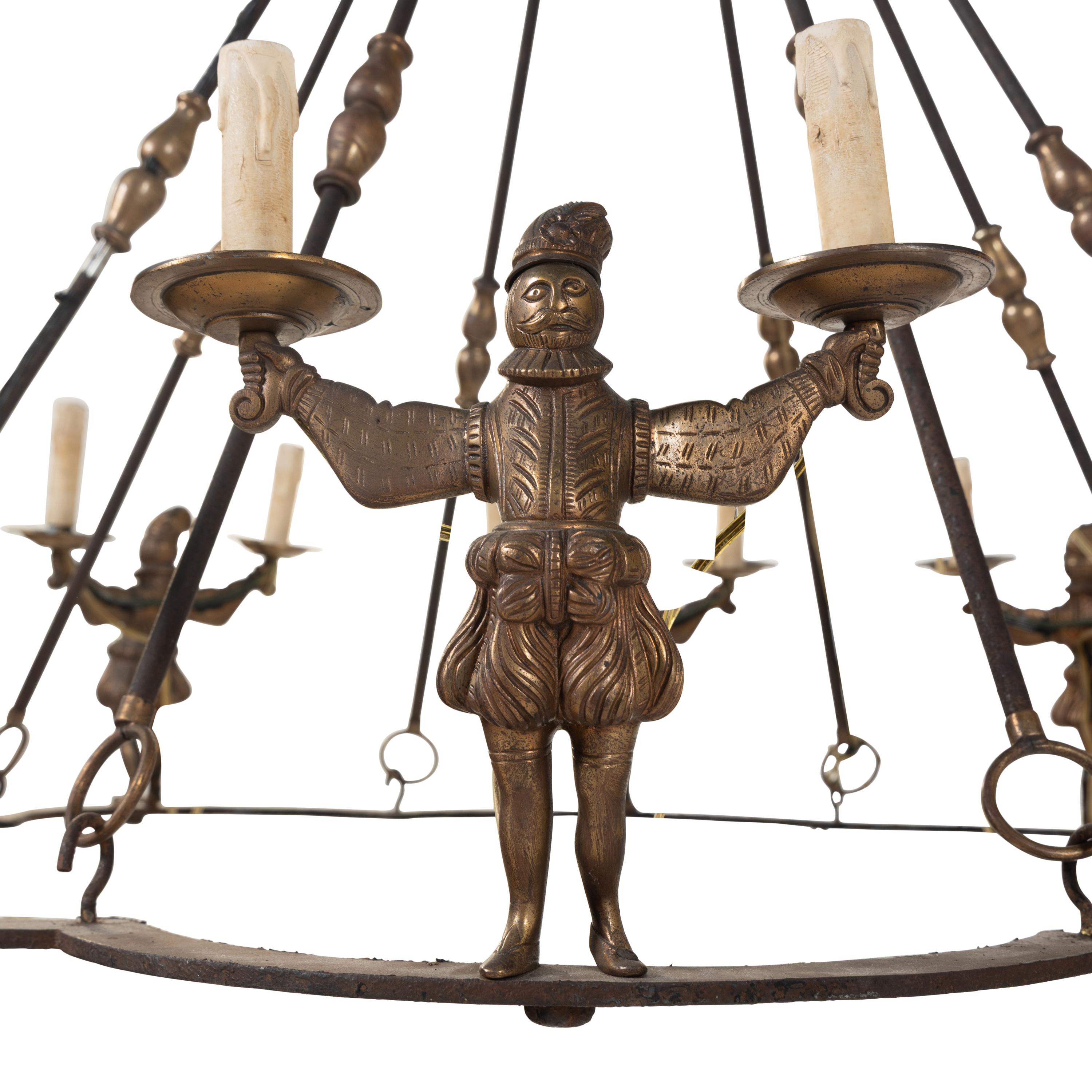A Bronze and Iron Figural Sixteen-Light Chandelier