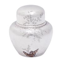 An Aesthetic Movement Japanesque Hammered Sterling Silver and Mixed Metal Tea Caddy