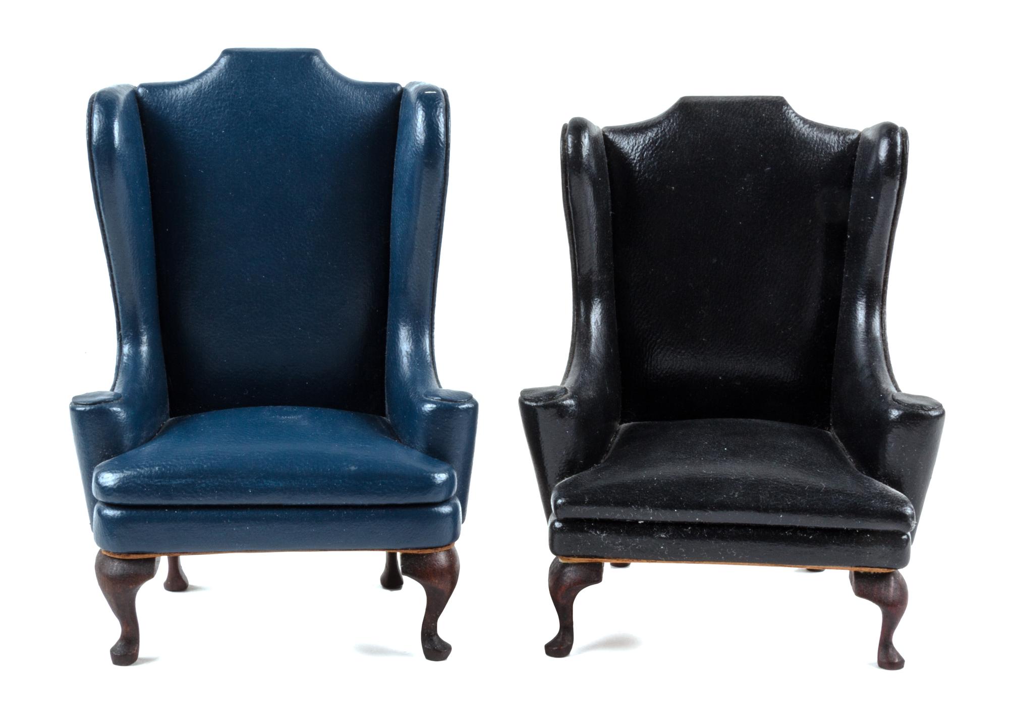 Two Leather Upholstered Wingback Chairs Height 4 x width 3 1/4 x depth 2 1/2 inches.