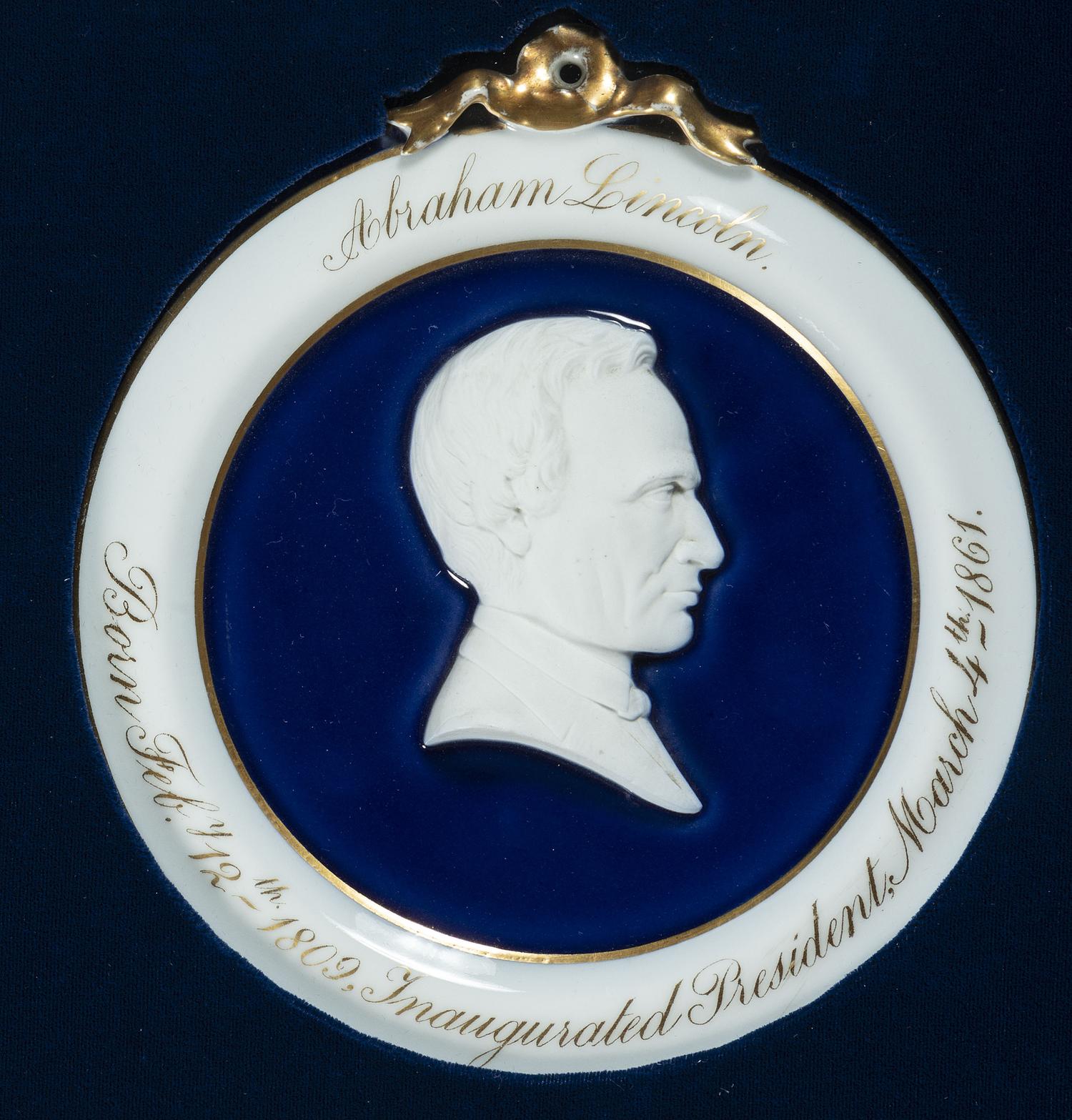 [LINCOLN, Abraham (1809-1865)]. Porcelain bas-relief inaugural wall plaque, ca 1861.