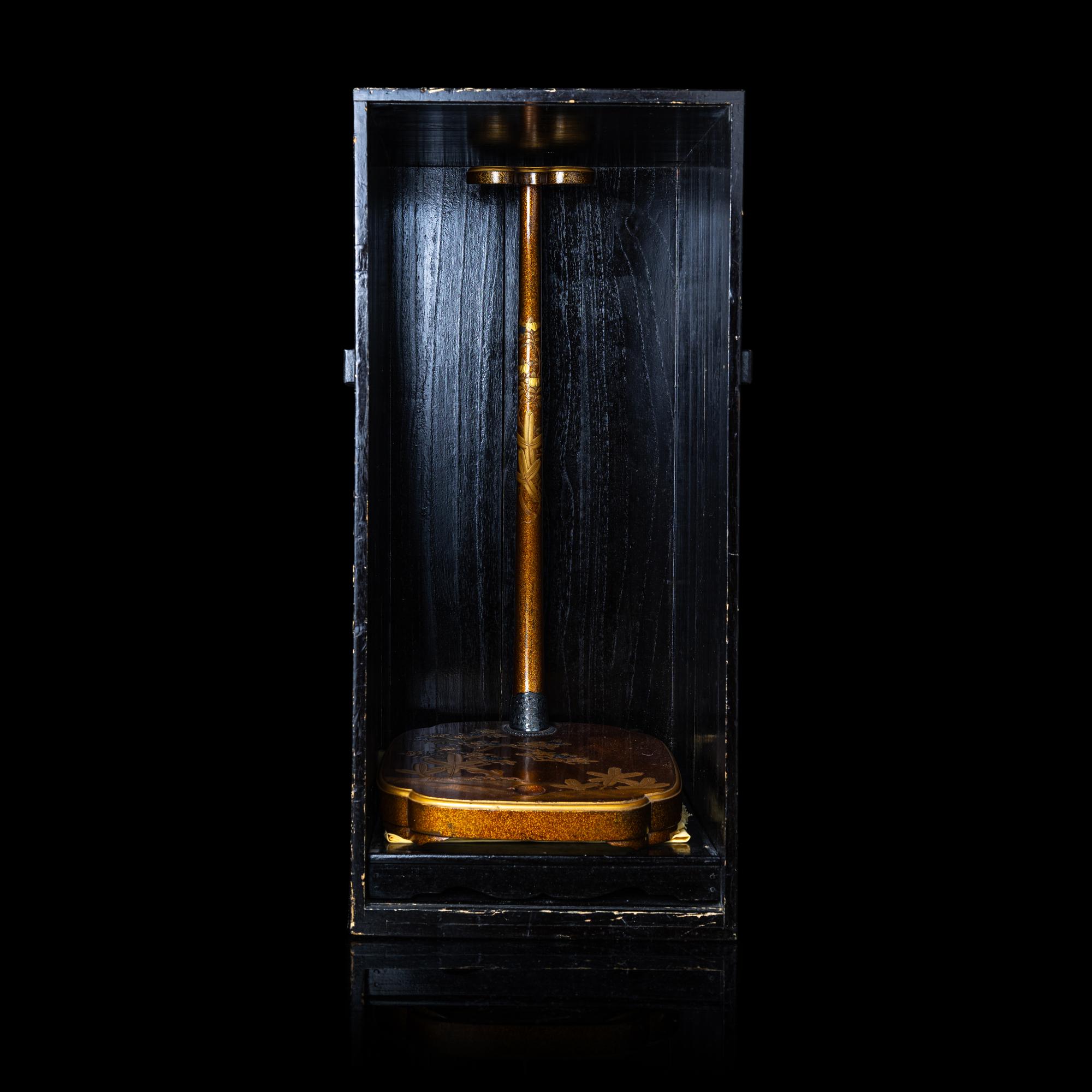 A Japanese Gold Lacquer Sword Stand, Tachi-kake, with Wood Box, Meiji Period 日本明治時期 梨子地松橘蒔繪太刀拵