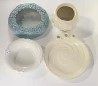 A Group of Seven Haeger Pottery Table Articles Length of longest 23 1/2 inches.